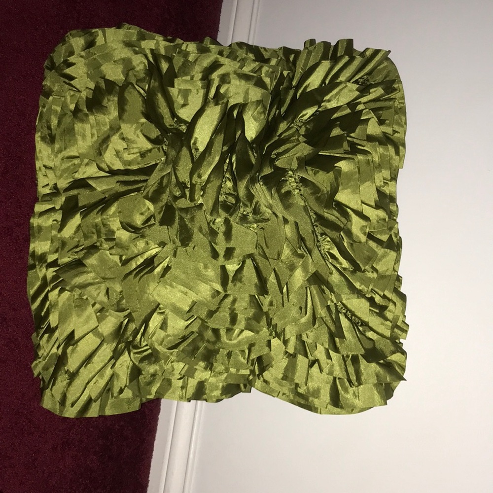 Green ruffled pillow